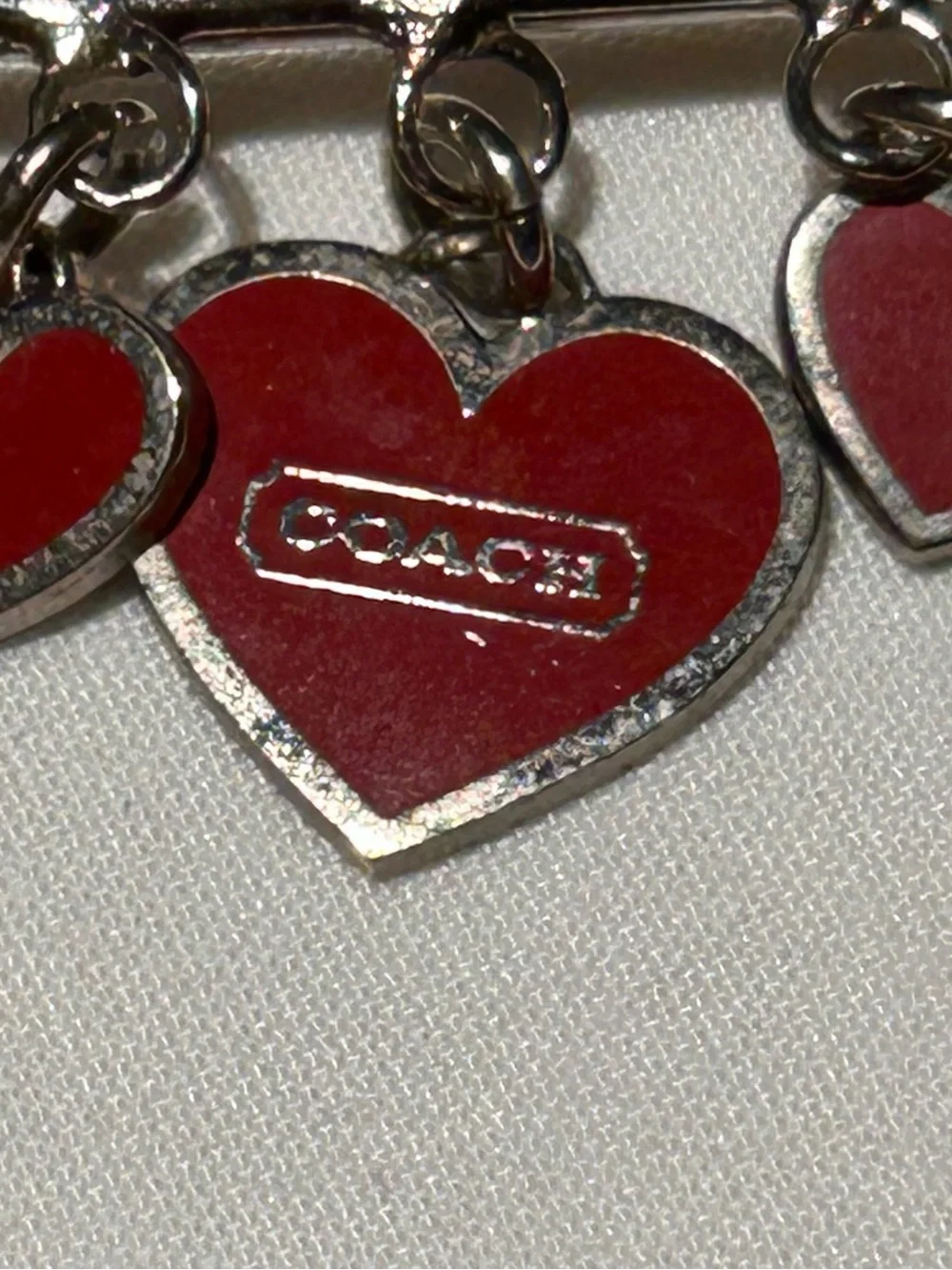 Vintage Coach Silver-Tone Brooch with Red Heart Charms